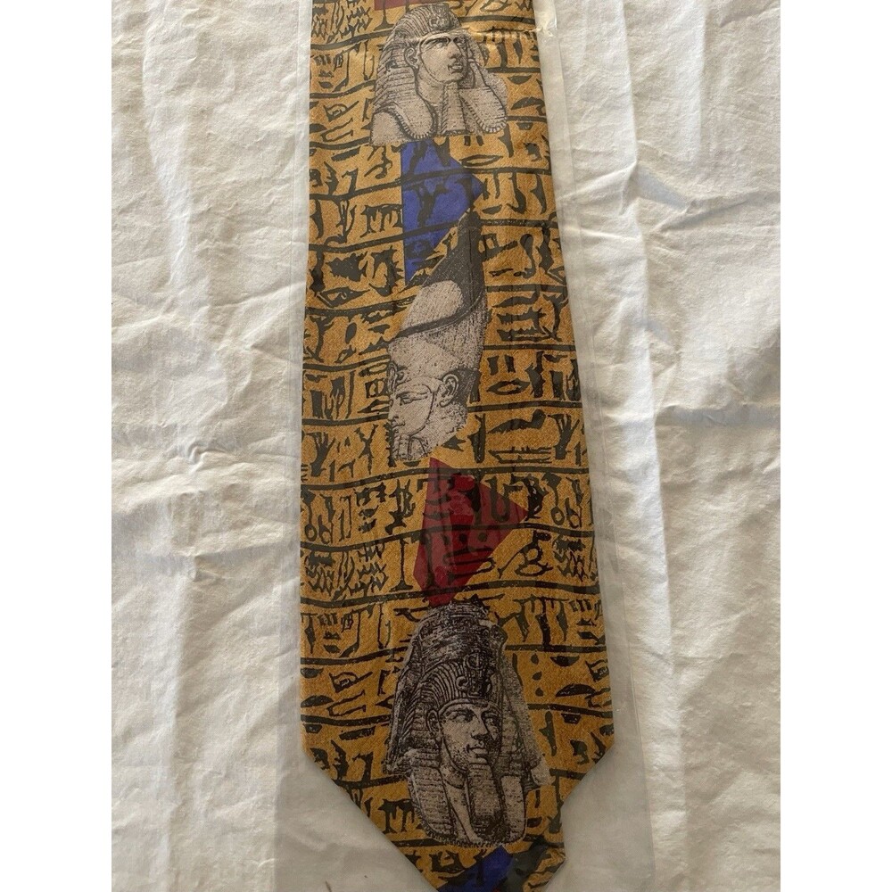 New Vintage Dead Stock 1980’sClaude Montana 100% Silk Tie in an Egyptian in Gold